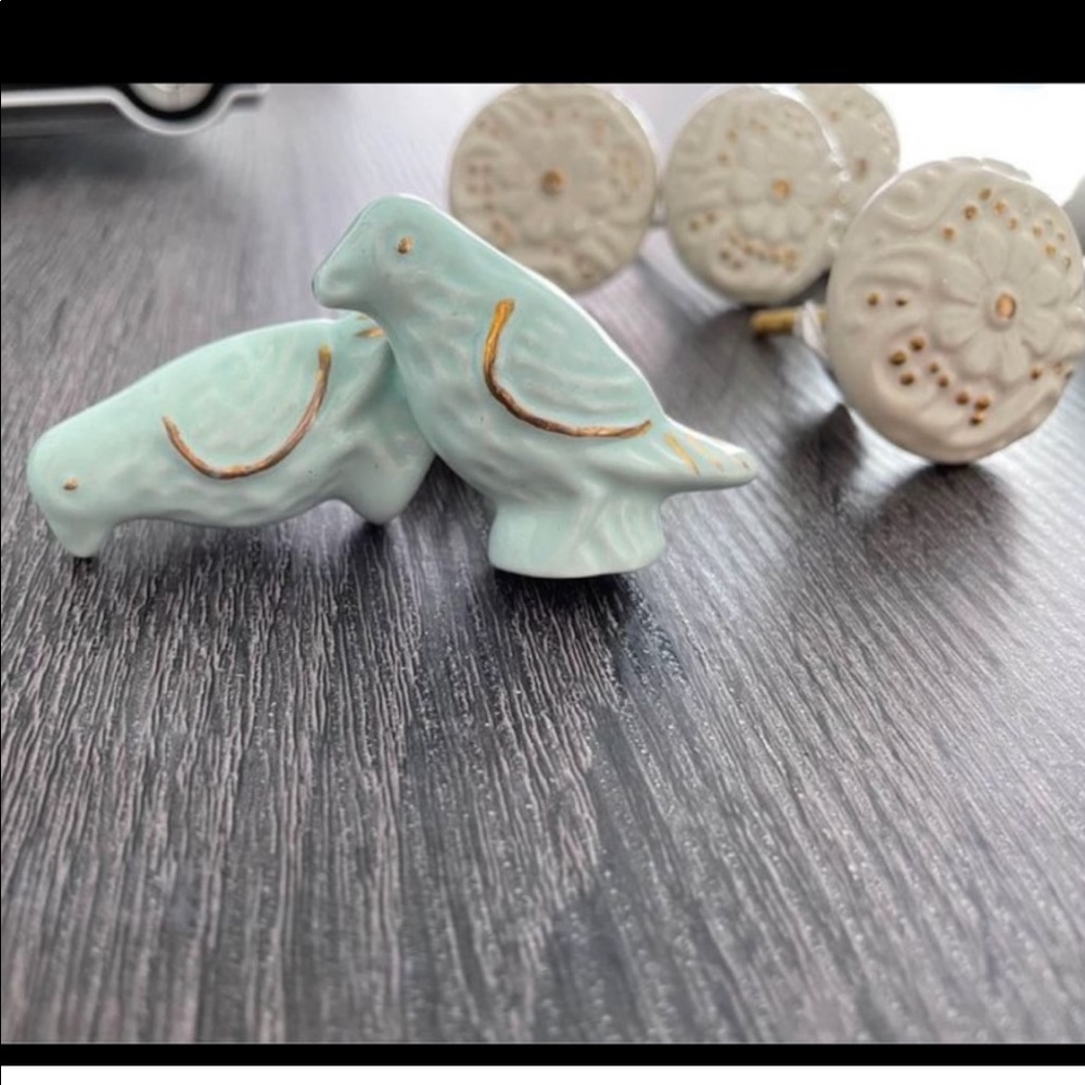Two bird drawer knobs